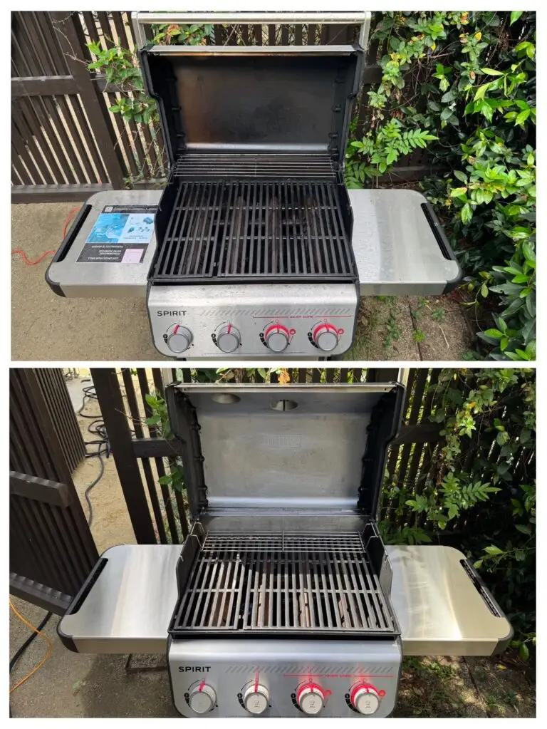 Outdoor grill with four burners and red dials on a patio, surrounded by greenery. The lid is open, revealing clean grates ready for cooking.
